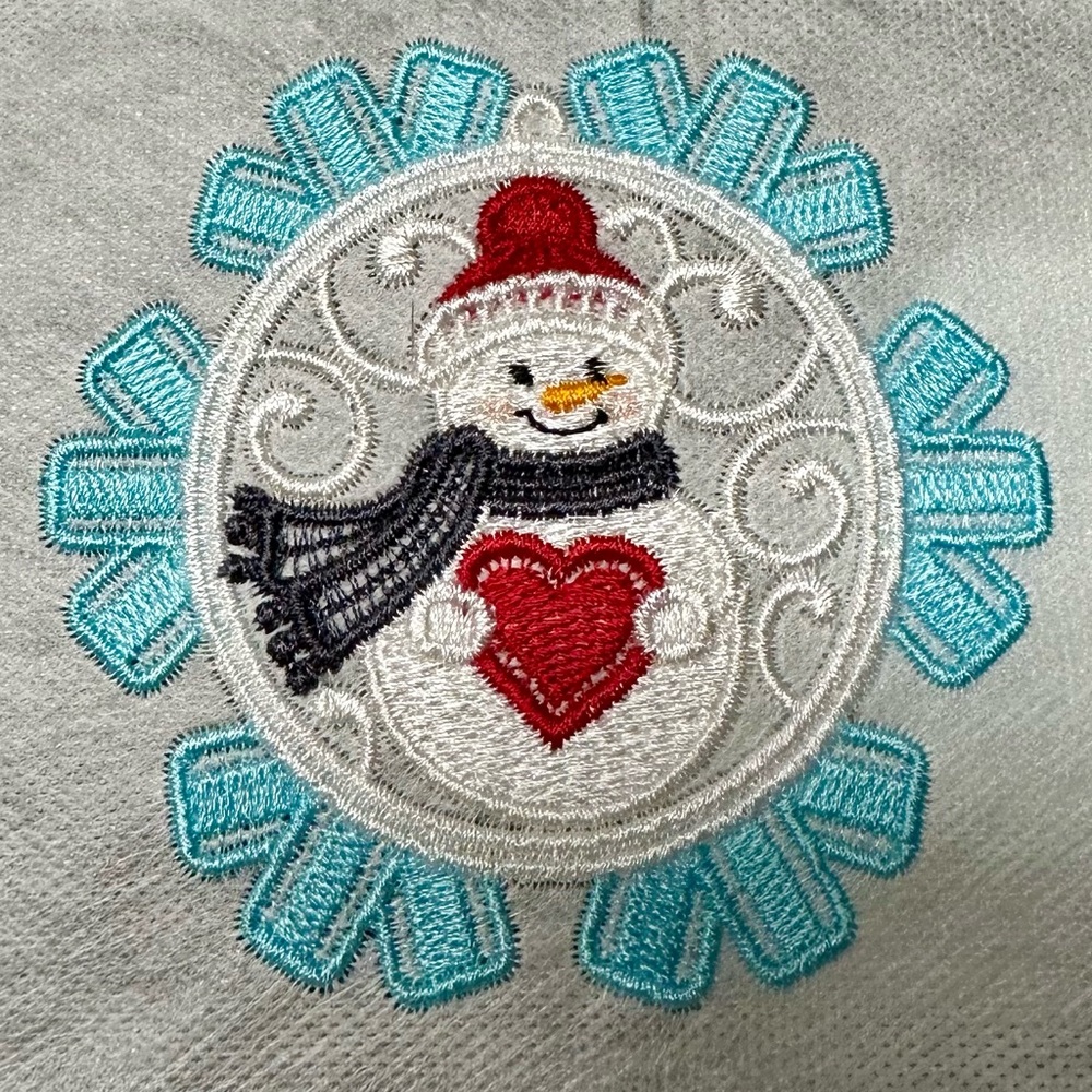 Snowman With A Heart Embroidered Freestanding Lace Ornament.